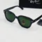 Sunglasses in Black Frame Green Lens