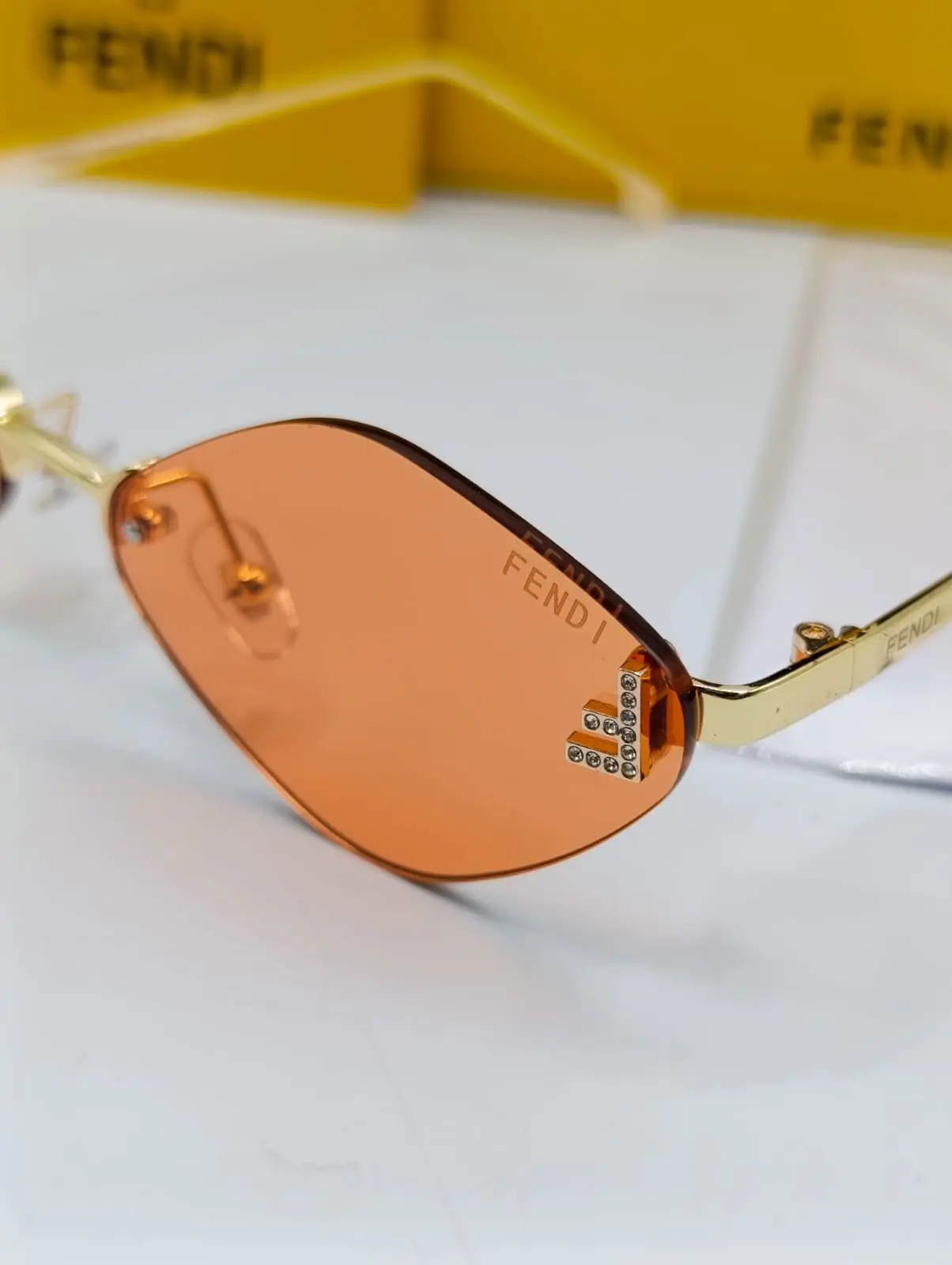 Almond Shape Orange Rimless Sunglasses